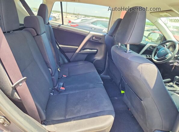 JTMZFREV1GJ077592 2016 TOYOTA RAV4 Gray Rear seats view