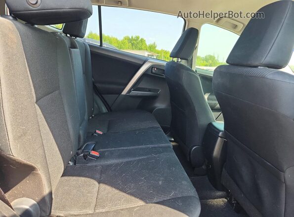 JTMZFREV1GJ081786 2016 TOYOTA RAV4 Gray Rear interior view