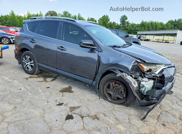 JTMZFREV1GJ081786 2016 TOYOTA RAV4 Gray Front right