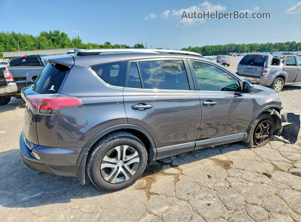 JTMZFREV1GJ081786 2016 TOYOTA RAV4 Gray Rear right