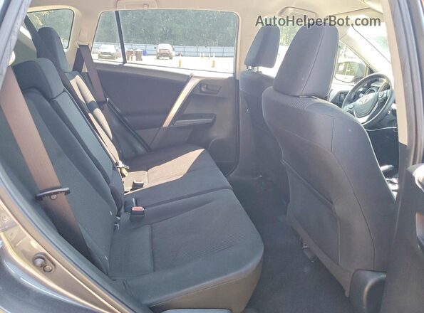 JTMZFREV1JJ752557 2018 TOYOTA RAV4 Gray Rear interior view