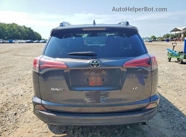 JTMZFREV1JJ752557 2018 TOYOTA RAV4 Gray Rear view
