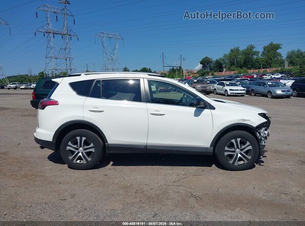 JTMZFREV2GJ086429 2016 TOYOTA RAV4 Белый Вид задней части салона