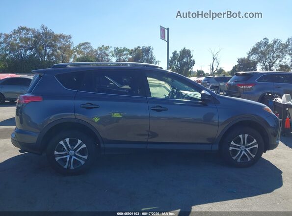JTMZFREV2JJ168913 2018 TOYOTA RAV4 Серый Вид задней части салона