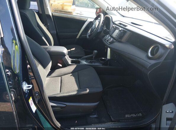 JTMZFREV3HJ717285 2017 TOYOTA RAV4 Blue Front interior view