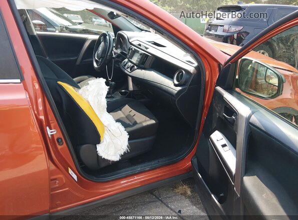 JTMZFREV4GD081036 2016 TOYOTA RAV4 Orange წინა სალონის ხედი