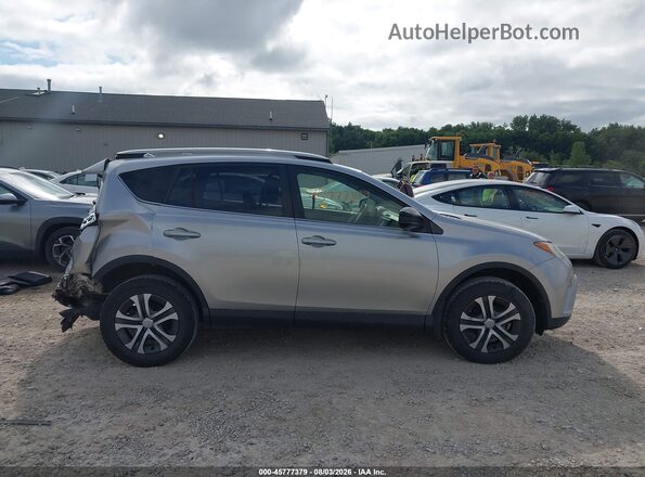 JTMZFREV4JJ167729 2018 TOYOTA RAV4 Light Blue Rear interior view