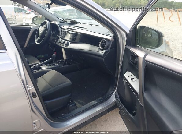 JTMZFREV4JJ167729 2018 TOYOTA RAV4 Light Blue Front interior view