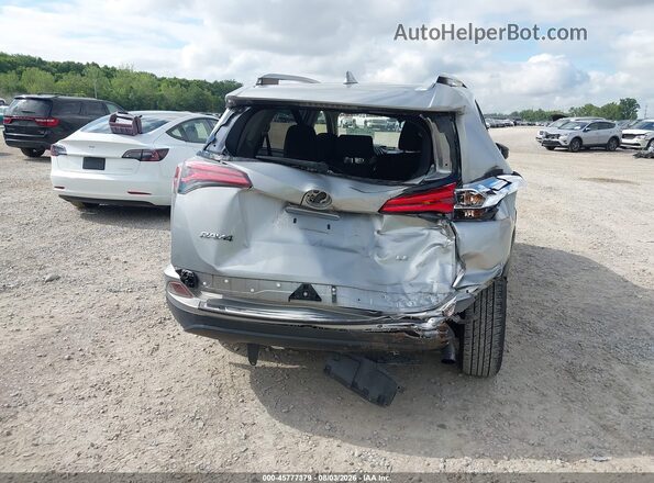 JTMZFREV4JJ167729 2018 TOYOTA RAV4 Light Blue Front view