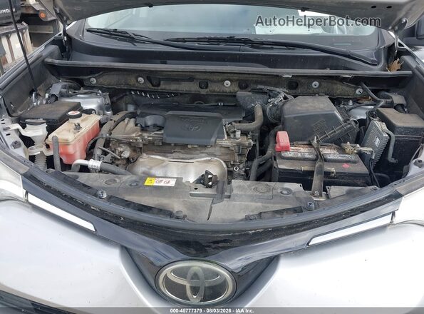 JTMZFREV4JJ167729 2018 TOYOTA RAV4 Light Blue Rear view