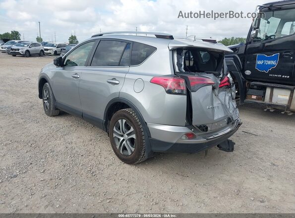 JTMZFREV4JJ167729 2018 TOYOTA RAV4 Light Blue Rear left