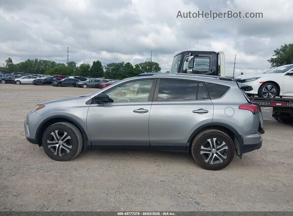 JTMZFREV4JJ167729 2018 TOYOTA RAV4 Light Blue 360 interior view