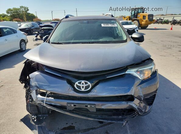 JTMZFREV5GJ075831 2016 TOYOTA RAV4 Gray Front view