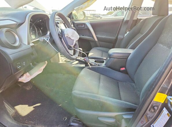 JTMZFREV5GJ075831 2016 TOYOTA RAV4 Gray Front interior view