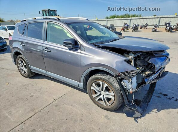 JTMZFREV5GJ075831 2016 TOYOTA RAV4 Gray Front right
