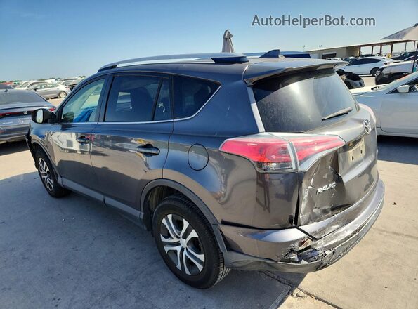 JTMZFREV5GJ075831 2016 TOYOTA RAV4 Gray Rear left