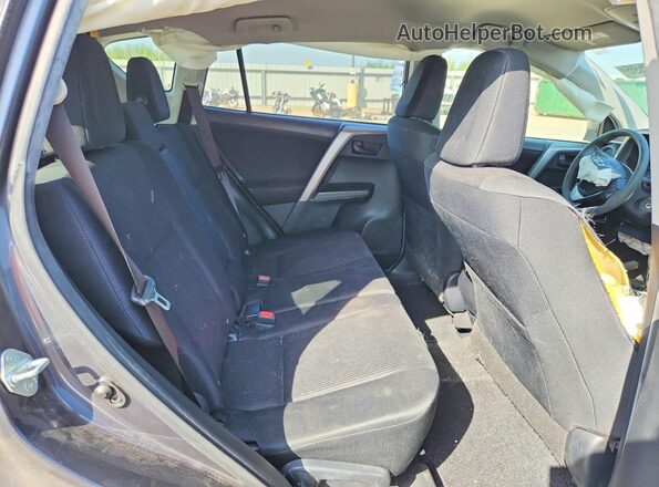 JTMZFREV5GJ075831 2016 TOYOTA RAV4 Gray Rear interior view
