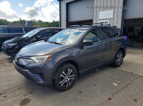 JTMZFREV5GJ088045 2016 TOYOTA RAV4 Gray Trasero izquierdo