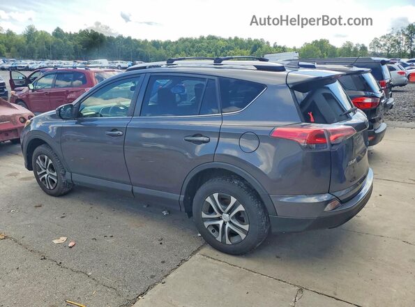 JTMZFREV5GJ088045 2016 TOYOTA RAV4 Gray Delantero derecho