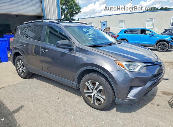 JTMZFREV5GJ088045 2016 TOYOTA RAV4 Gray Vista del salpicadero