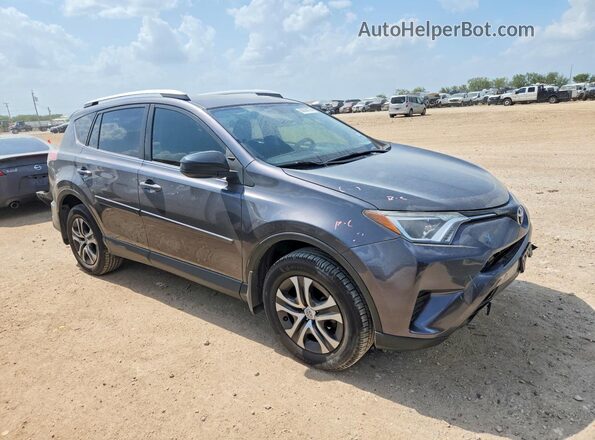 JTMZFREV5GJ096663 2016 TOYOTA RAV4 Gray Front right