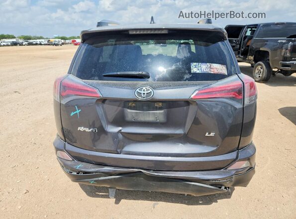 JTMZFREV5GJ096663 2016 TOYOTA RAV4 Gray Rear view