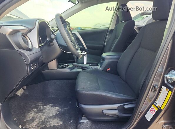 JTMZFREV5GJ096663 2016 TOYOTA RAV4 Gray Front interior view