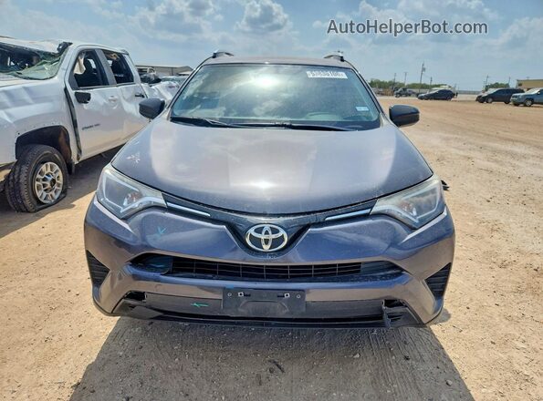 JTMZFREV5GJ096663 2016 TOYOTA RAV4 Gray Front view