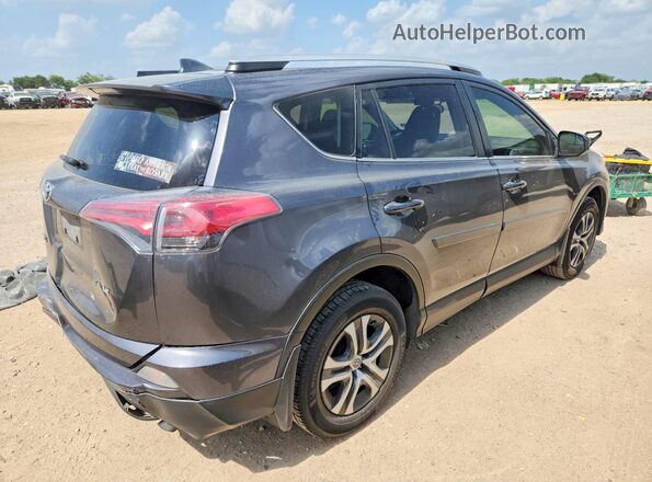 JTMZFREV5GJ096663 2016 TOYOTA RAV4 Gray Rear right