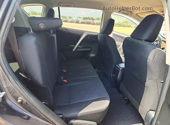 JTMZFREV5GJ096663 2016 TOYOTA RAV4 Gray Rear interior view