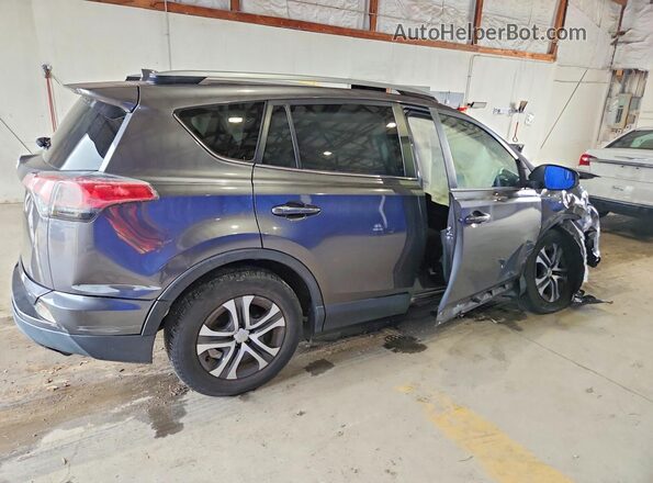 JTMZFREV5HJ104634 2017 TOYOTA RAV4 Gray Trasero derecho