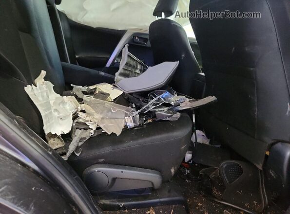JTMZFREV5HJ104634 2017 TOYOTA RAV4 Gray Vista interior trasera