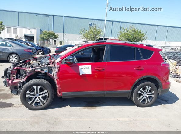 JTMZFREV5HJ124320 2017 TOYOTA RAV4 Red 