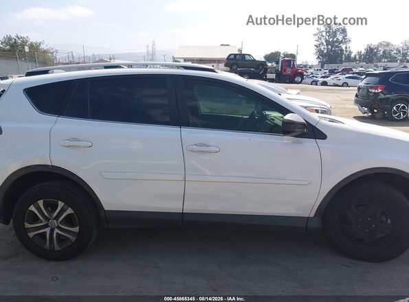 JTMZFREV6HJ709598 2017 TOYOTA RAV4 White Вид задньої частини салону