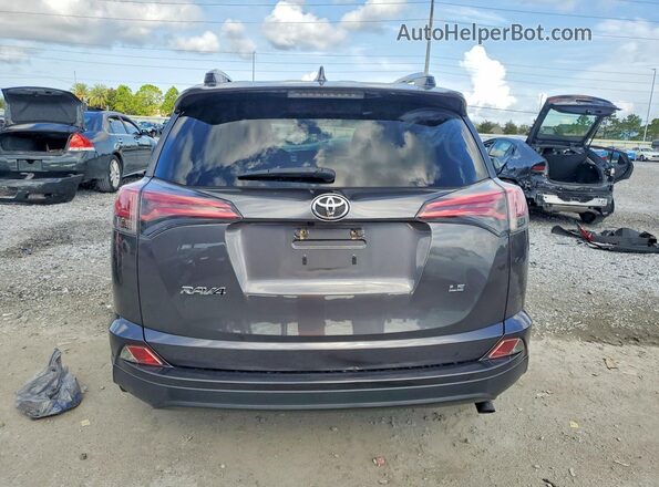JTMZFREV8HJ720683 2017 TOYOTA RAV4 Gray Vista trasera