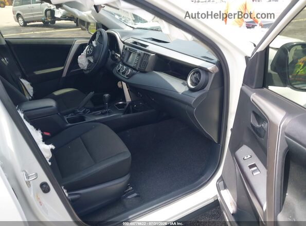 JTMZFREV8JJ728918 2018 TOYOTA RAV4 White Front interior view