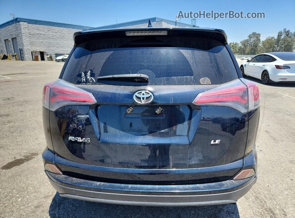 JTMZFREV9HJ719252 2017 TOYOTA RAV4 Черный Вид сзади