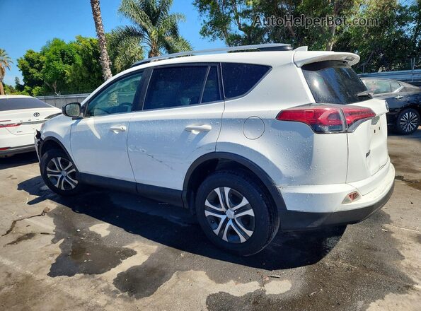 JTMZFREVXHJ701987 2017 TOYOTA RAV4 White Trasero izquierdo