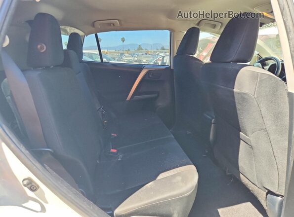 JTMZFREVXHJ701987 2017 TOYOTA RAV4 White Vista interior trasera