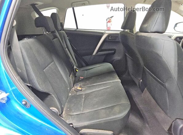 JTMZFREVXJJ151471 2018 TOYOTA RAV4 Blue Rear interior view