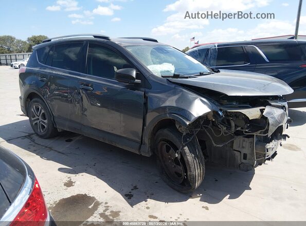 JTMZFREVXJJ739211 2018 TOYOTA RAV4 Gray Widok wnętrza z tyłu