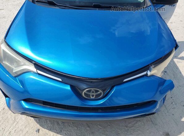 JTMZFREVXJJ749351 2018 TOYOTA RAV4 Синий Вид задней части салона