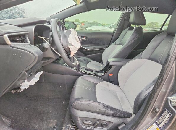 JTNC4MBE1S3234789 2025 TOYOTA COROLLA Серый Вид салона спереди