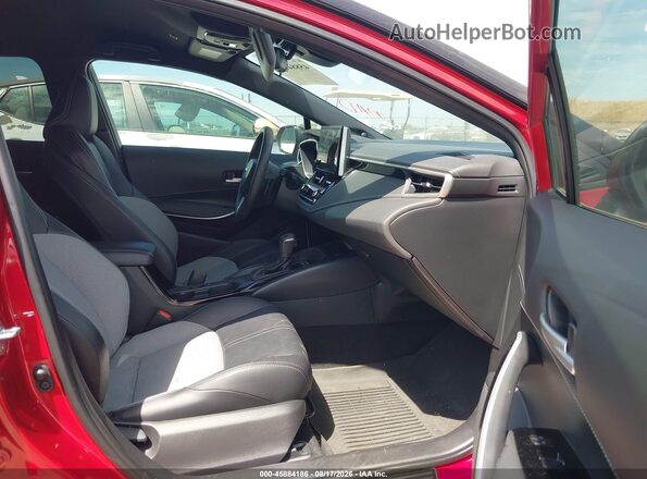 JTNC4MBE3S3235748 2025 TOYOTA COROLLA Red Front interior view