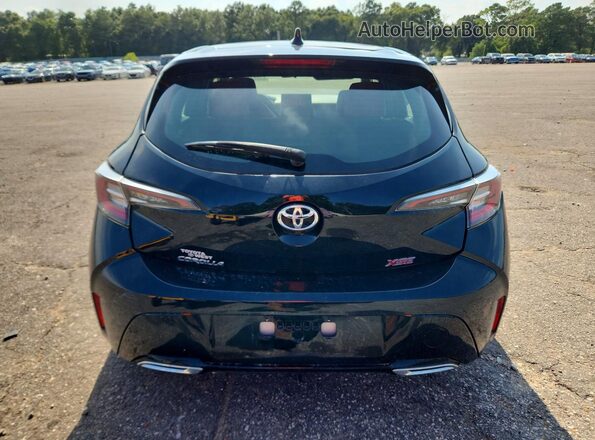 JTNC4RBE9L3101891 2020 TOYOTA COROLLA Black Rear view