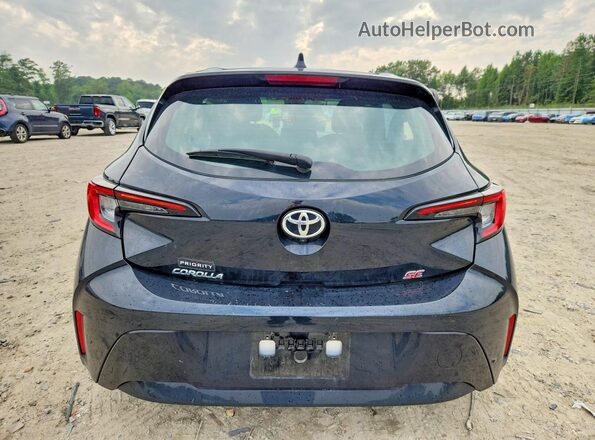 JTND4MBE2R3219815 2024 TOYOTA COROLLA Black Rear view