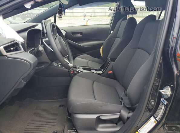 JTND4MBE6S3243833 2025 TOYOTA COROLLA Black Front interior view