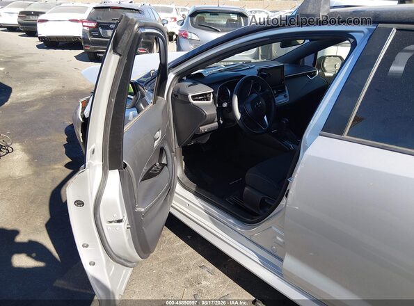 JTND4MBE8M3129352 2021 TOYOTA COROLLA Silver Vista interior delantera