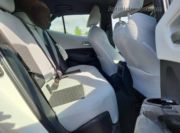 JTND4MBEXM3139252 2021 TOYOTA COROLLA White Rear seats view
