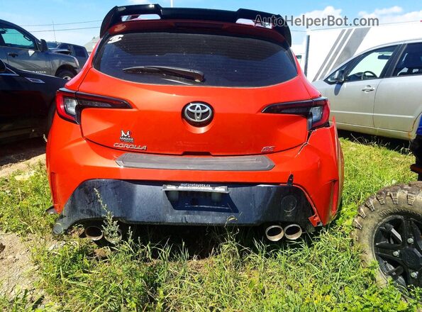 JTNK4MBE5P3199385 2023 TOYOTA COROLLA Orange Rear view